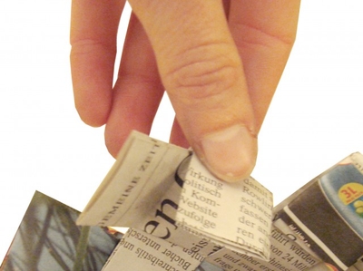 Hand faltet Papier